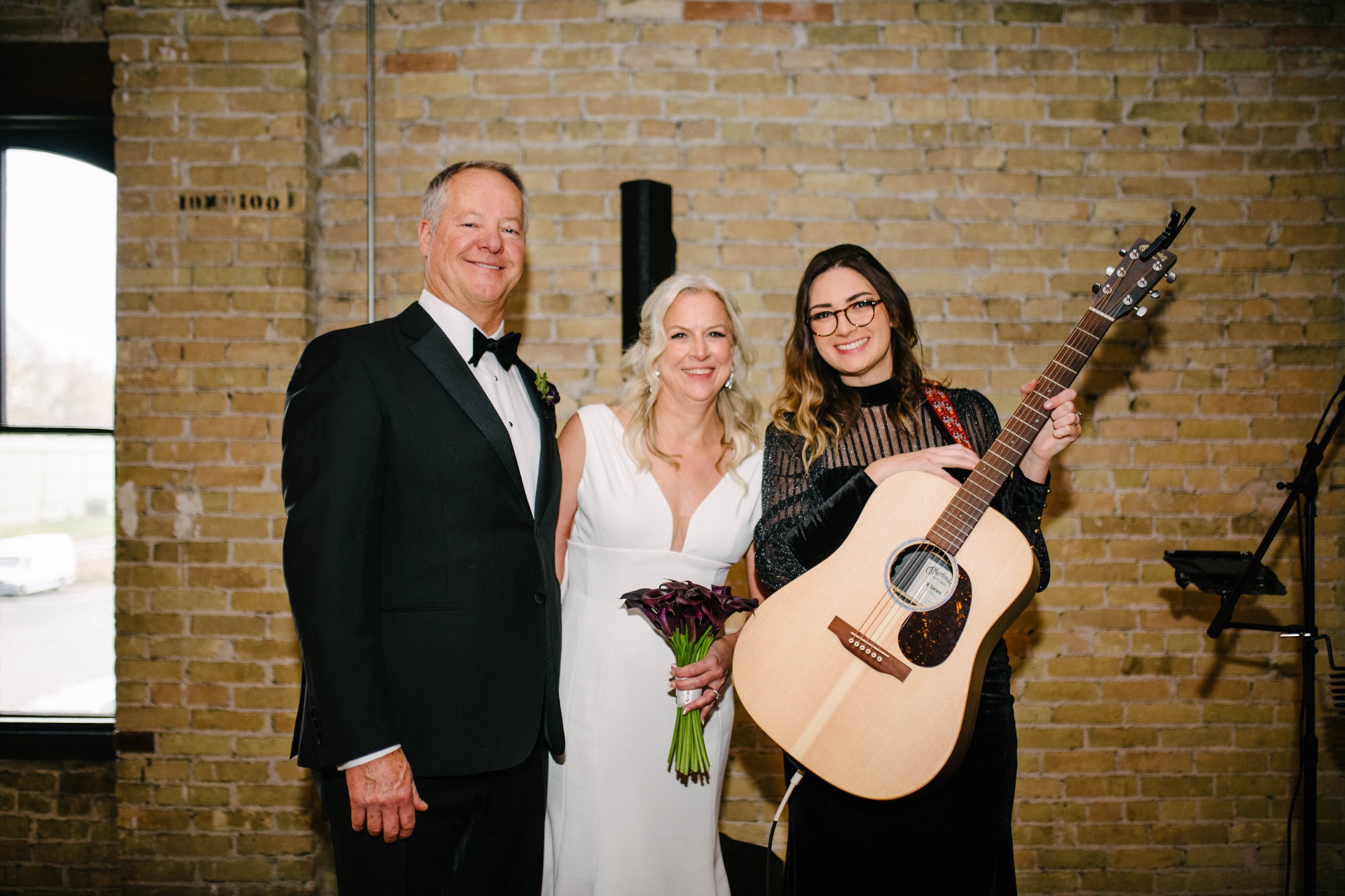 Anna Marie with bride and father at wedding ceremony